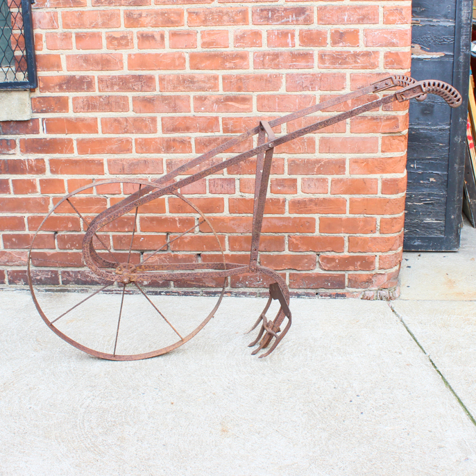 Antique Cast Iron and Bent Steel Garden Plow EBTH